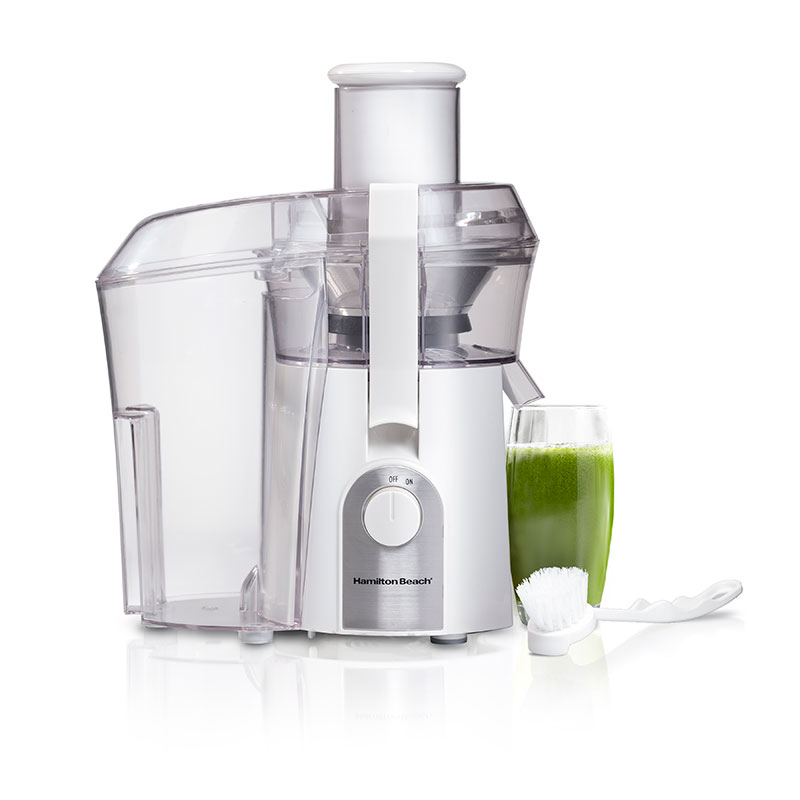 Official image of the Hamilton Beach 67702 white Big Mouth centrifugal extractor, separate side pulp bin, single control, cleaning brush and a glass shown under the spout