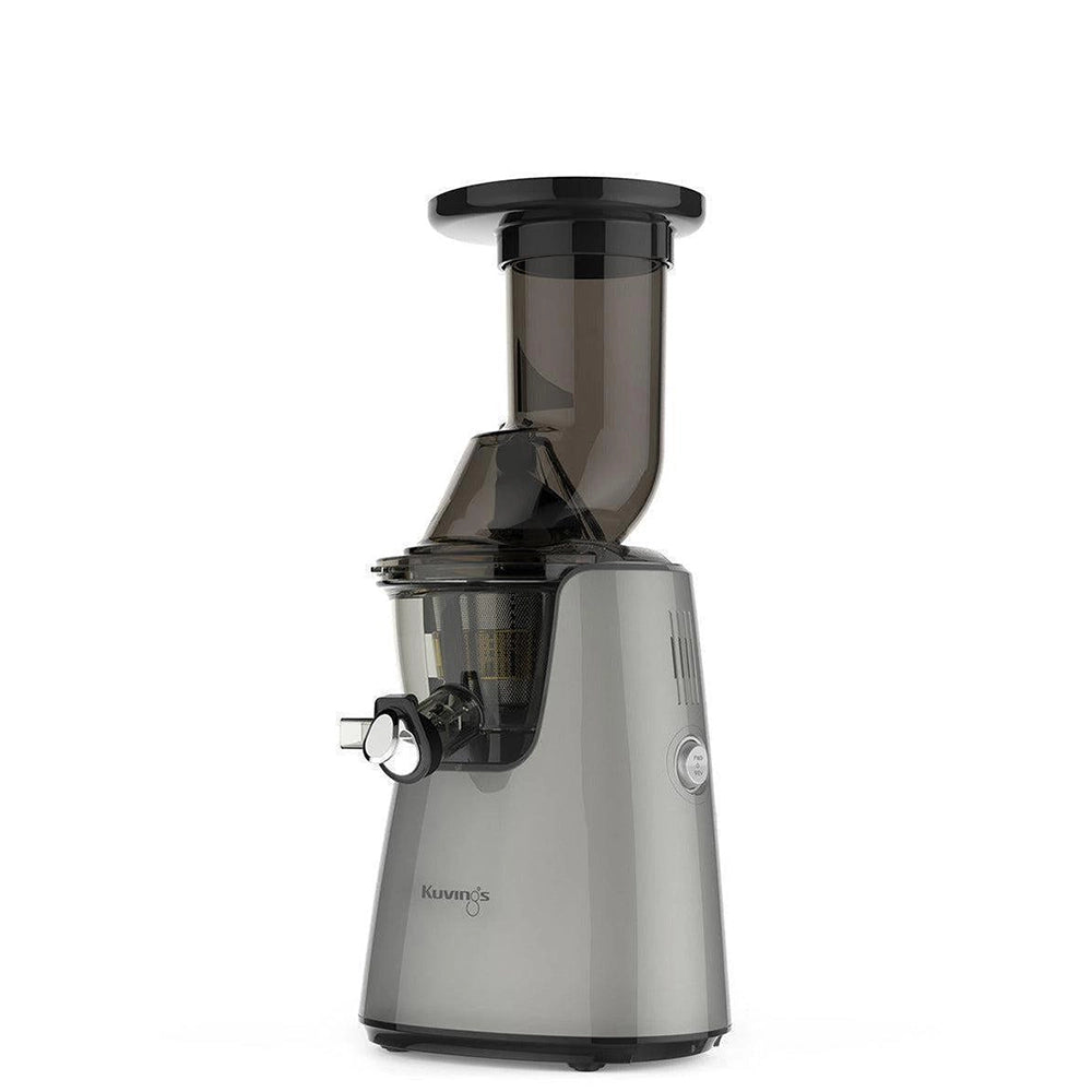 Silver Kuvings C7000 household juicer with its removable top hopper and clear juicing bowl.