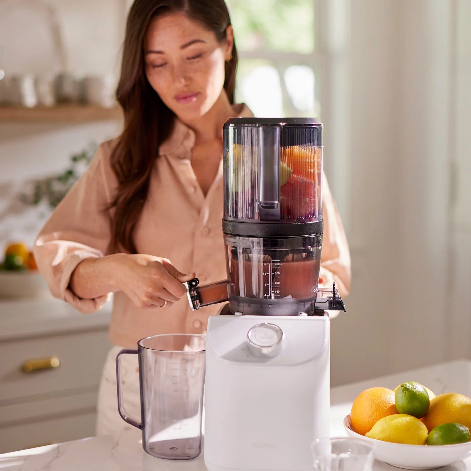 Nama C2 JB100 juicer configuration with its cold-press chamber on the shared base