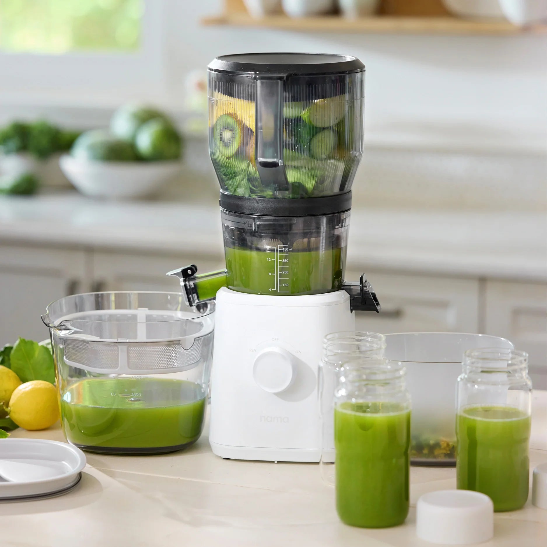 Nama J2 XL SJ200X juicer shown with the larger batch-pitcher setup