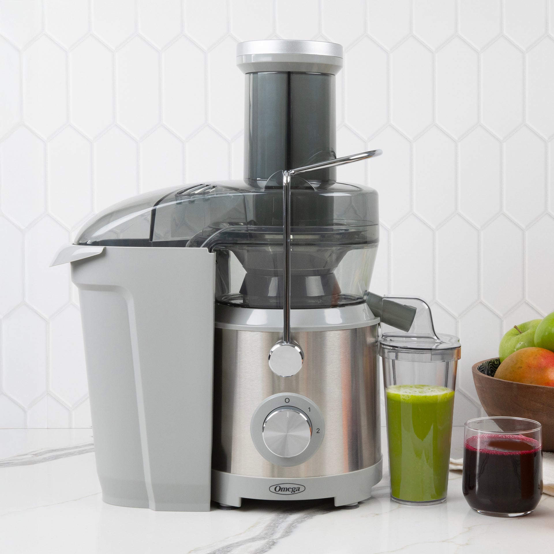 Stainless-steel Omega OMJCHSXLCSV13 high-speed juicer with its extra-large chute